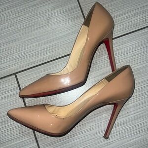 Christian Louboutin nude pumps worked